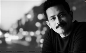 Sophisticated Atul Kulkarni in a monochrome look